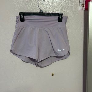 Purple Nike shorts